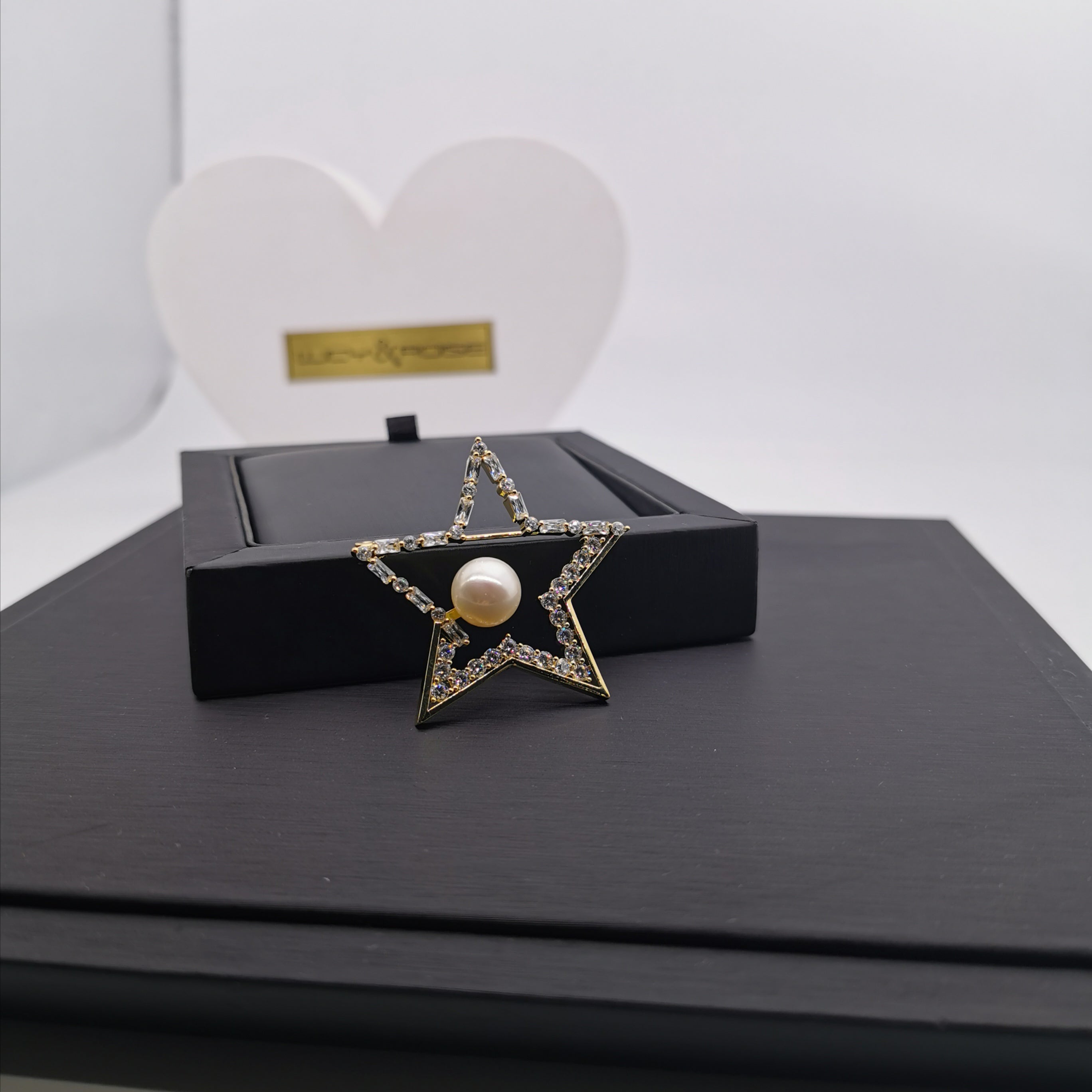 Star+zirconia freshwater pearl brooch