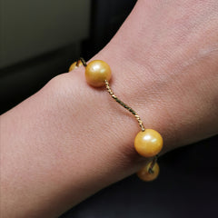 Sterling silver gold rhodium plated with gold colour freshwater pearl strech bracelet