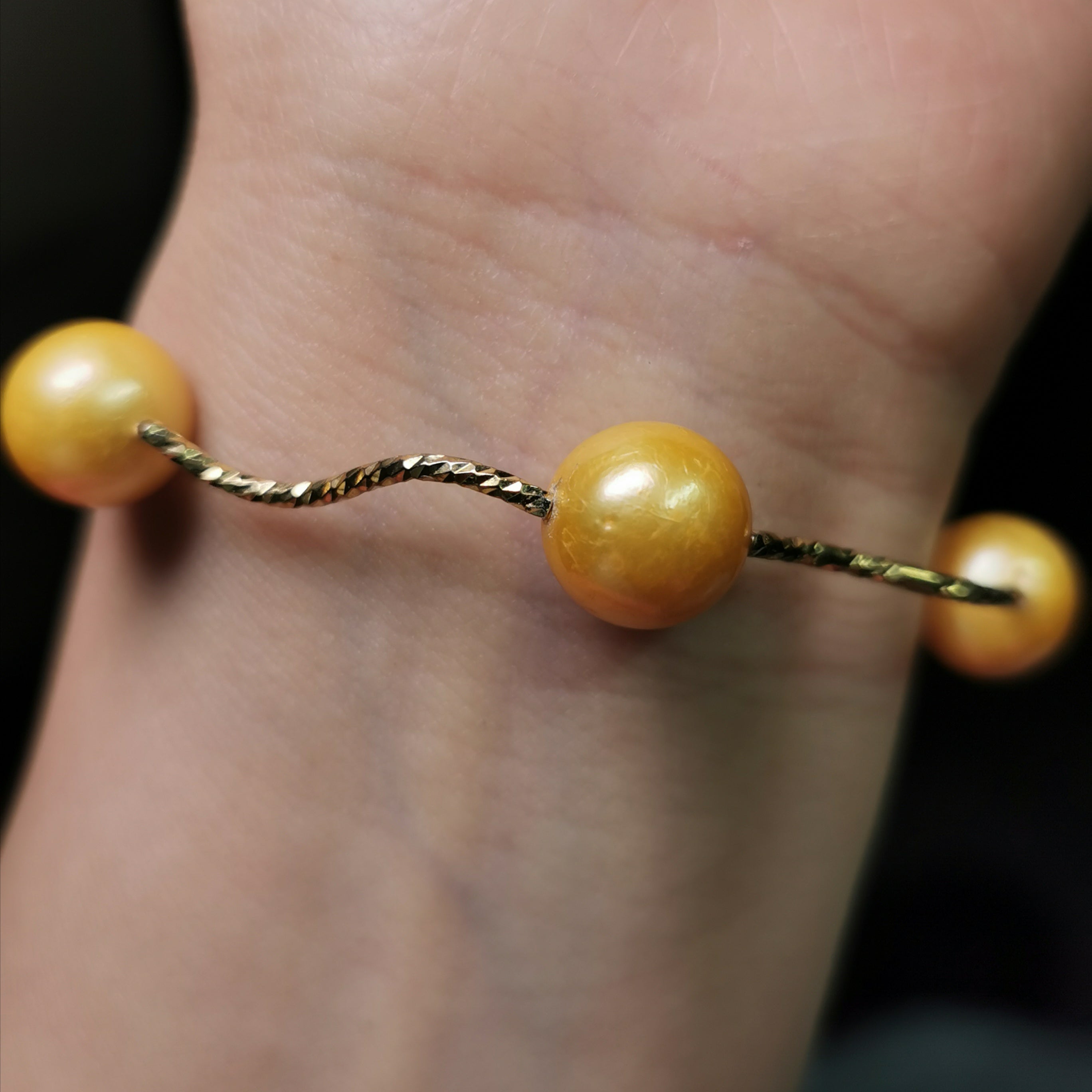 Sterling silver gold rhodium plated with gold colour freshwater pearl strech bracelet