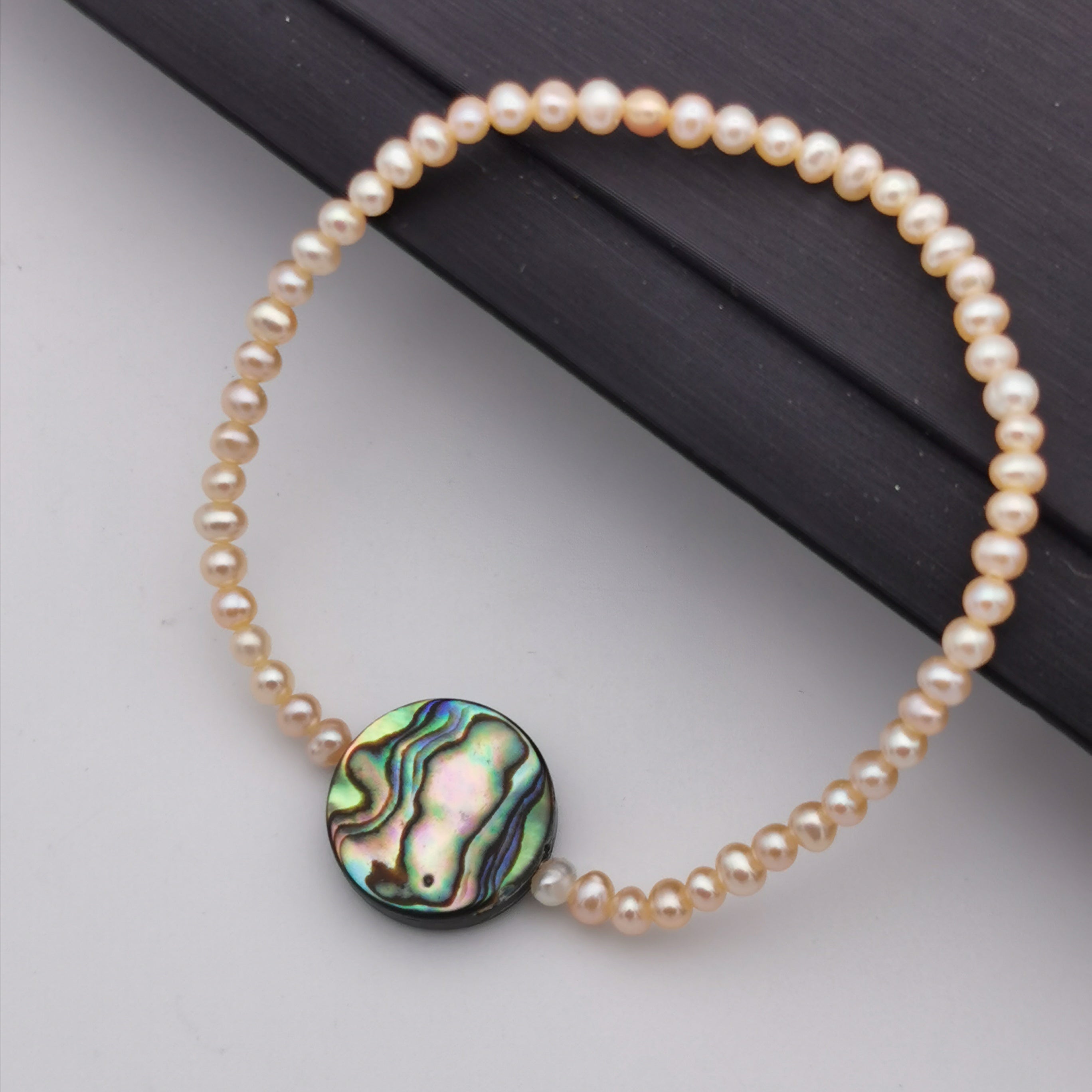 3mm mini pink freshwater pearl with Paua shell stretch bracelet