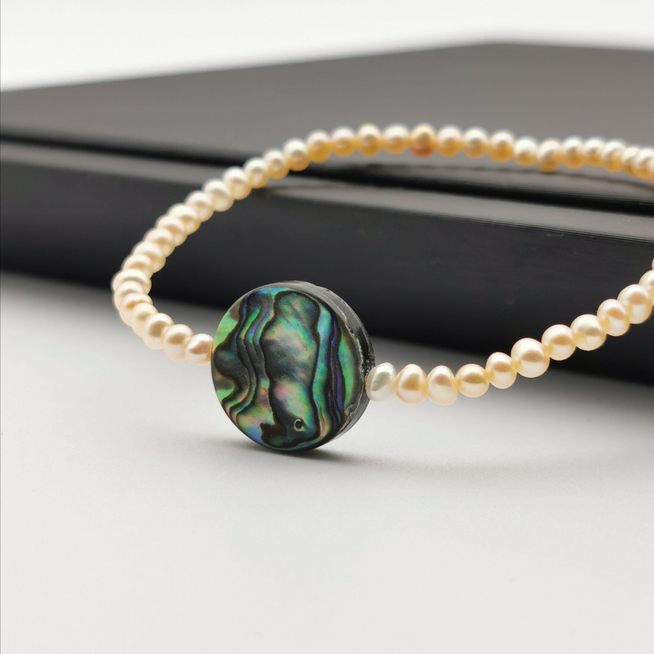 3mm mini pink freshwater pearl with Paua shell stretch bracelet