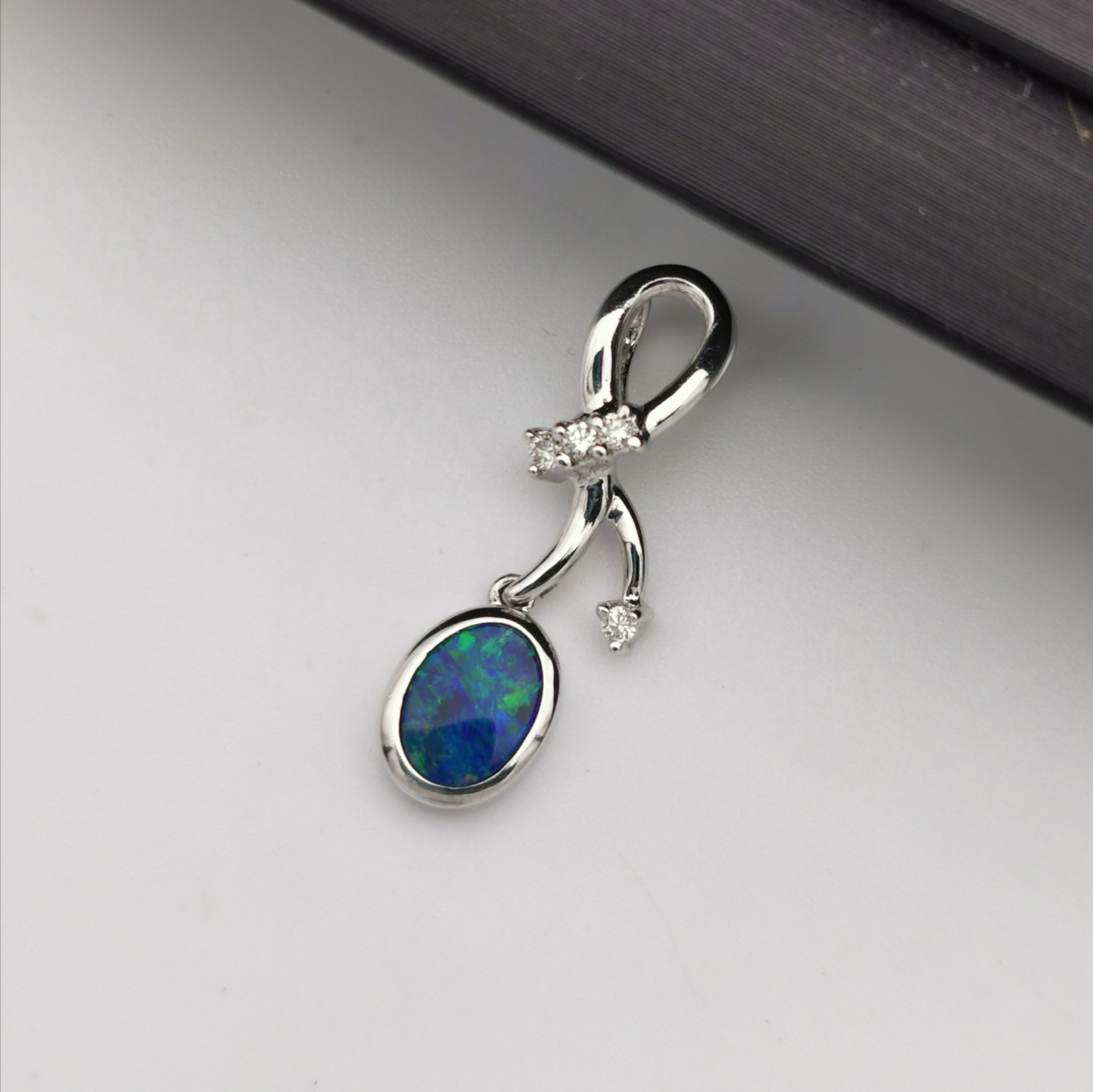 14k white gold with diamond Australian opal pendant