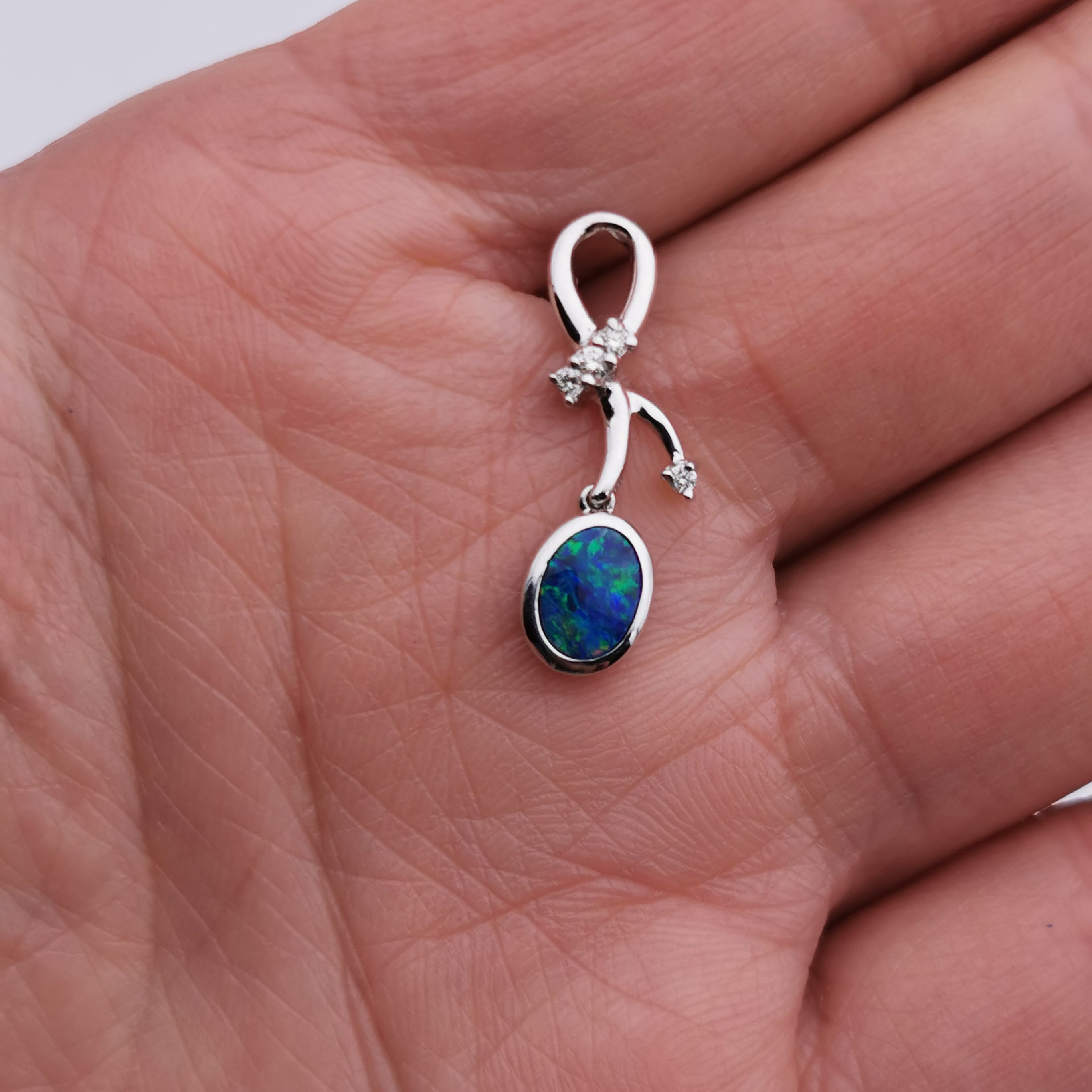 14k white gold with diamond Australian opal pendant