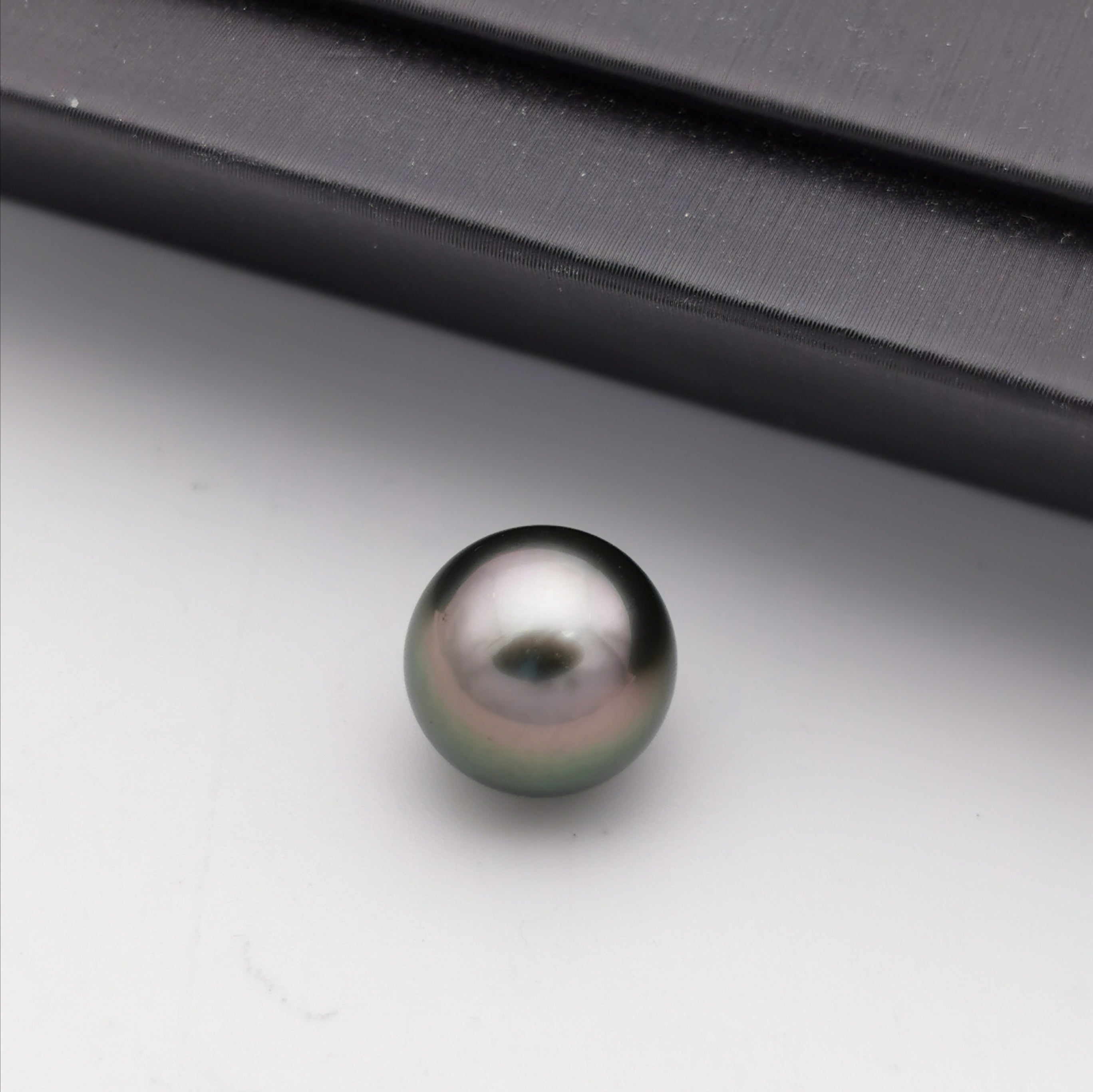 10.58 mm genuine round black Tahitian loose pearl