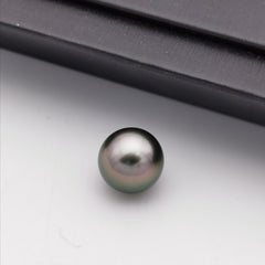 10.58 mm genuine round black Tahitian loose pearl
