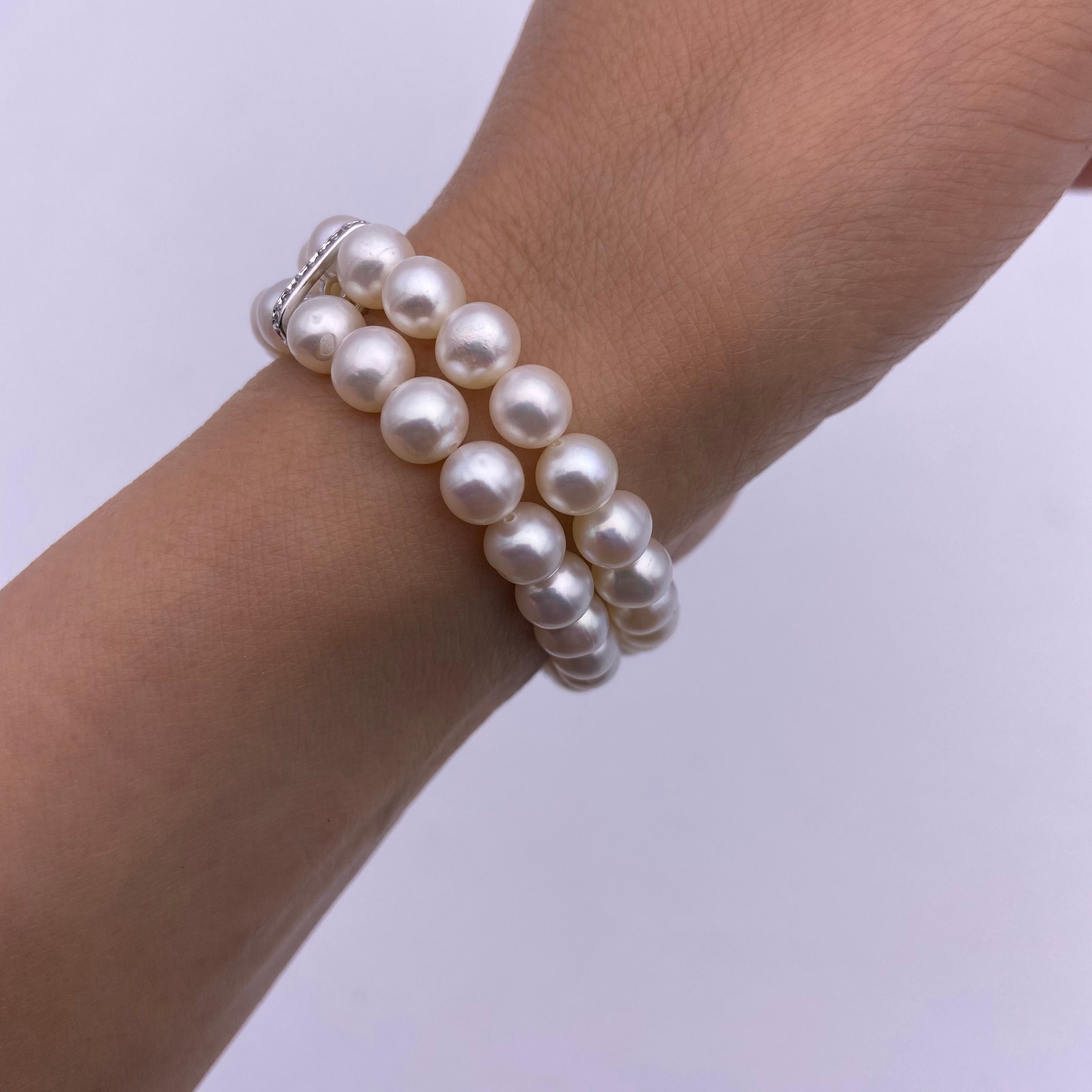 6.5-7mm freshwater pearl with sterling silver charm stretch bracelet