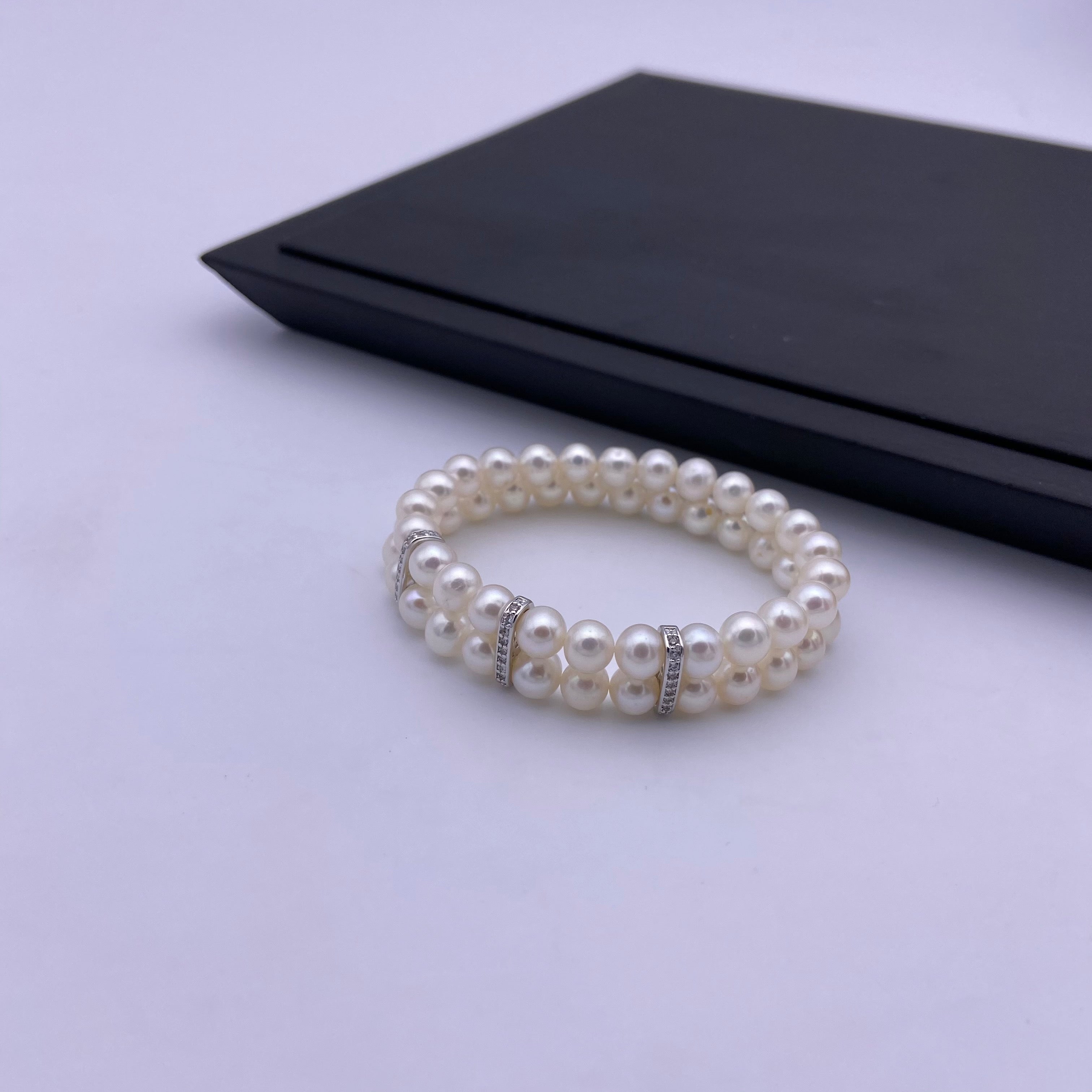 6.5-7mm freshwater pearl with sterling silver charm stretch bracelet