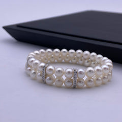 6.5-7mm freshwater pearl with sterling silver charm stretch bracelet