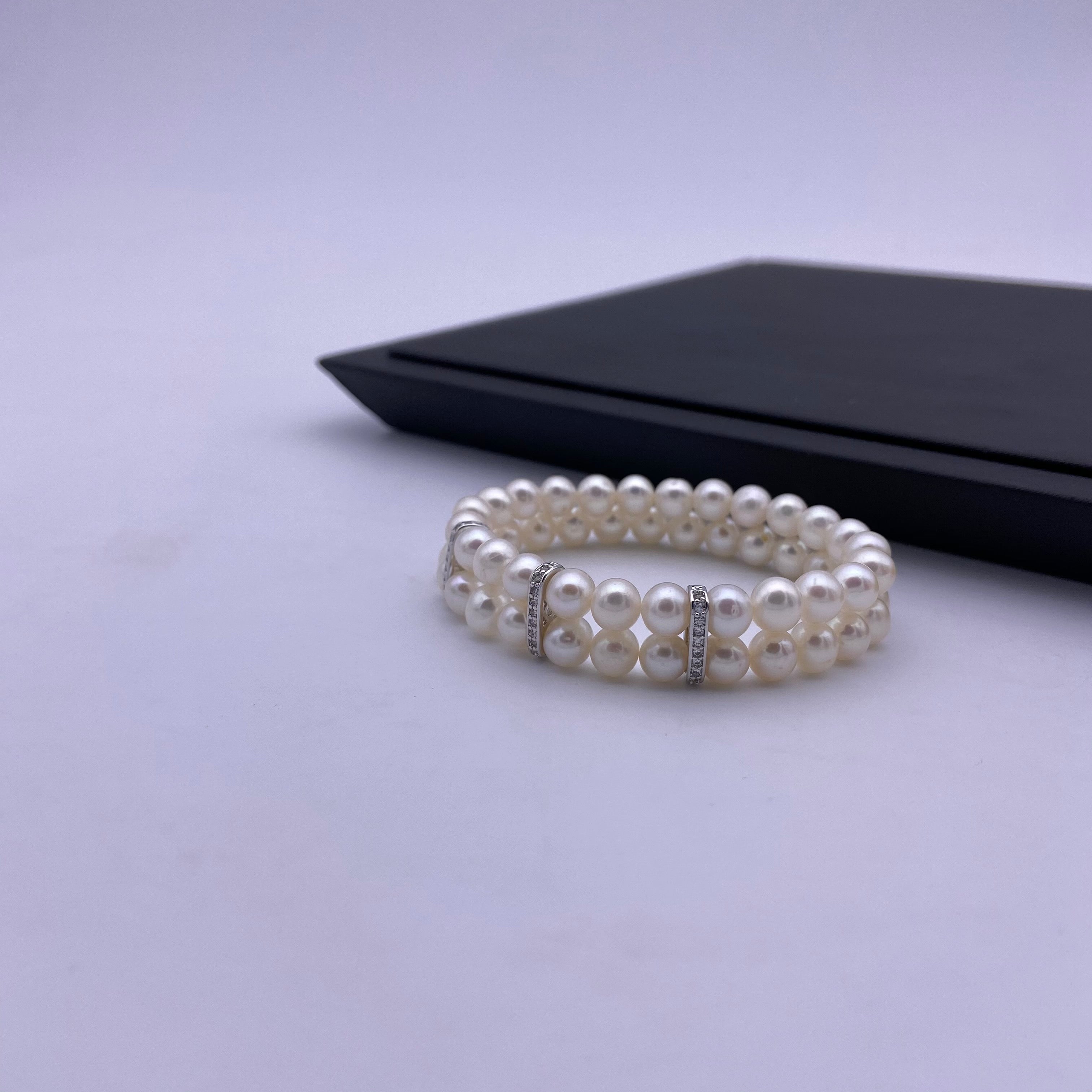 6.5-7mm freshwater pearl with sterling silver charm stretch bracelet