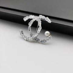 Letter X freshwater pearl brooch