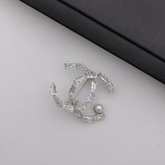 Letter X freshwater pearl brooch
