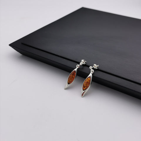 Dangling sterling silver with Baltic Amber earring