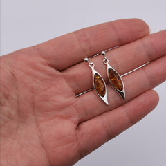 Dangling sterling silver with Baltic Amber earring