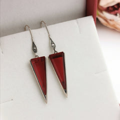Sterling silver with created ruby earring