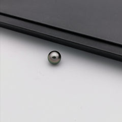 10.58 mm genuine round black Tahitian loose pearl