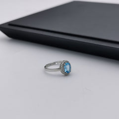 Delicate sterling silver blue adjustable topaz ring