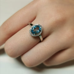 Delicate sterling silver blue adjustable topaz ring