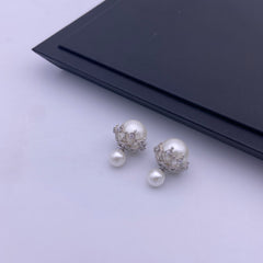 Sterling silver shell pearl studs