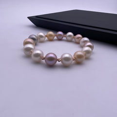 Multi colour freshwater pearl with rose gold alloy beads stretch bracelet